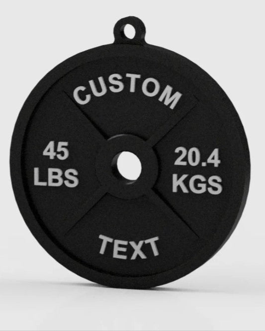 Black weight plate with measurement text on a white background