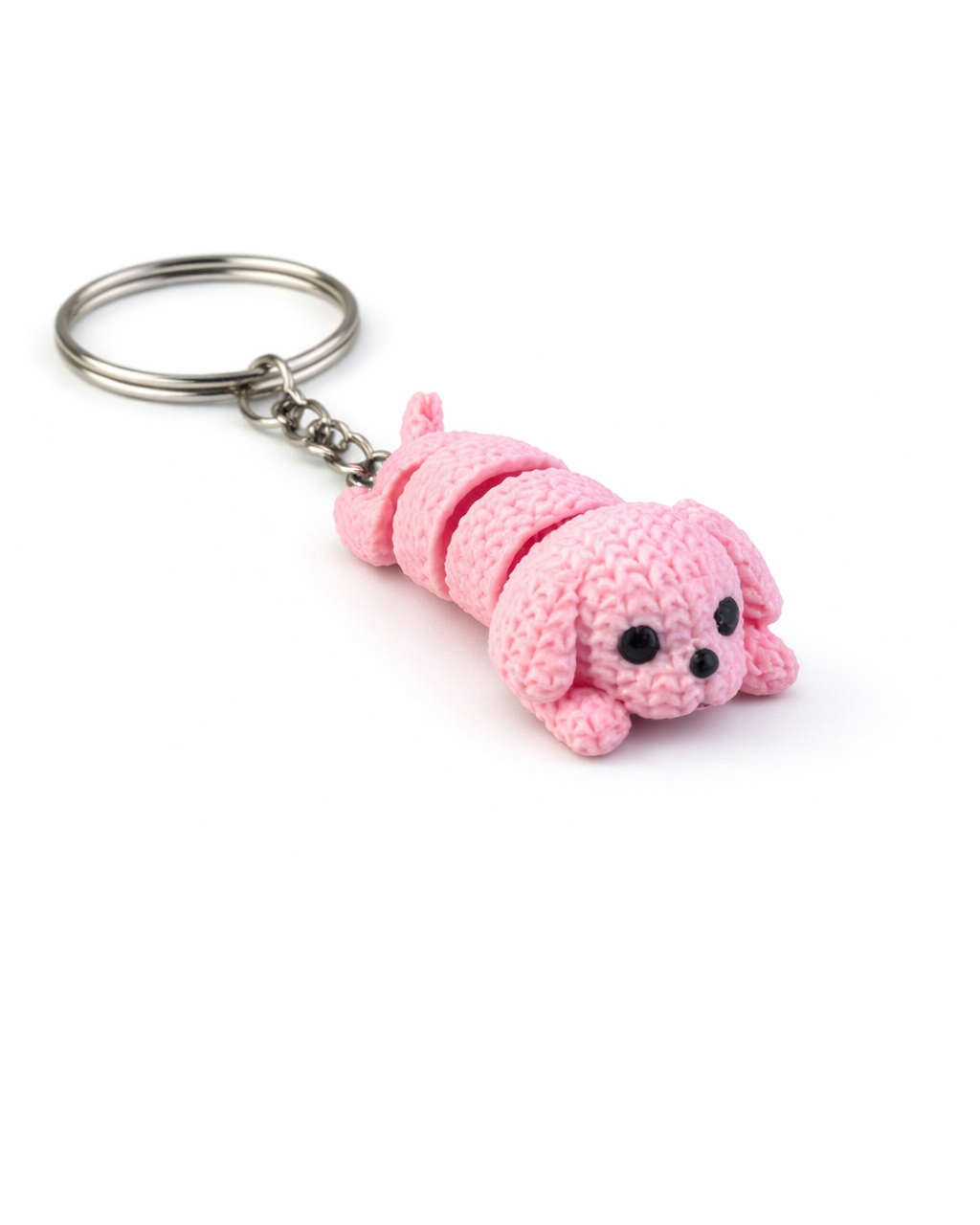 Pink caterpillar-shaped keychain on a white background