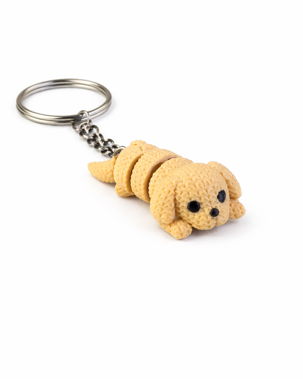 Dog-shaped keychain on a white background