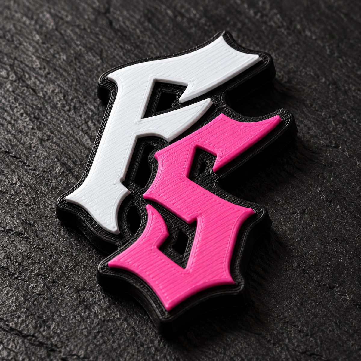 3D magnetic badge front and back showing twin magnets and steel bar