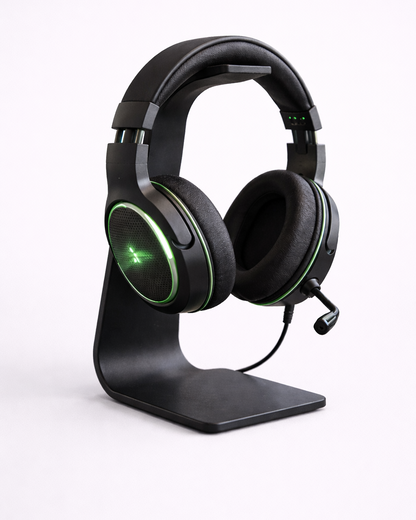 Gaming headset with green LED lights on a stand against a white background