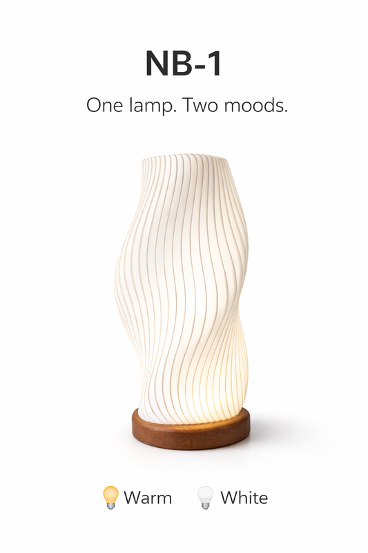 Table lamp with wavy design on a white background, labeled 'NB-1' with text 'One lamp. Two moods.'