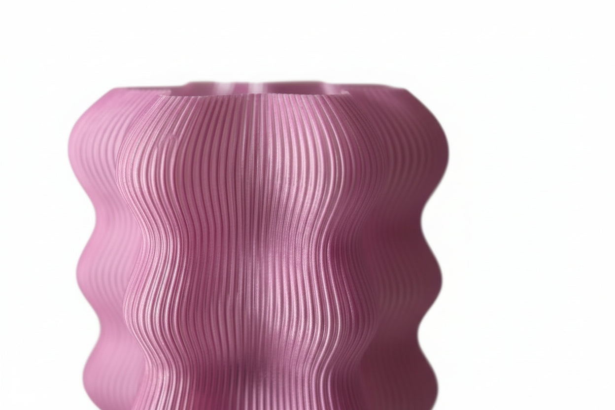 Close-up of a textured pink object with a blurred background