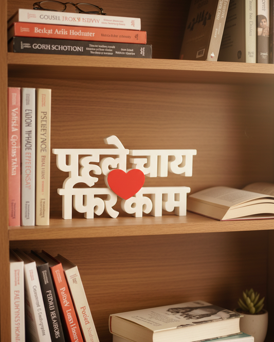 Wooden shelf with books and a decorative piece with text and a heart on it.